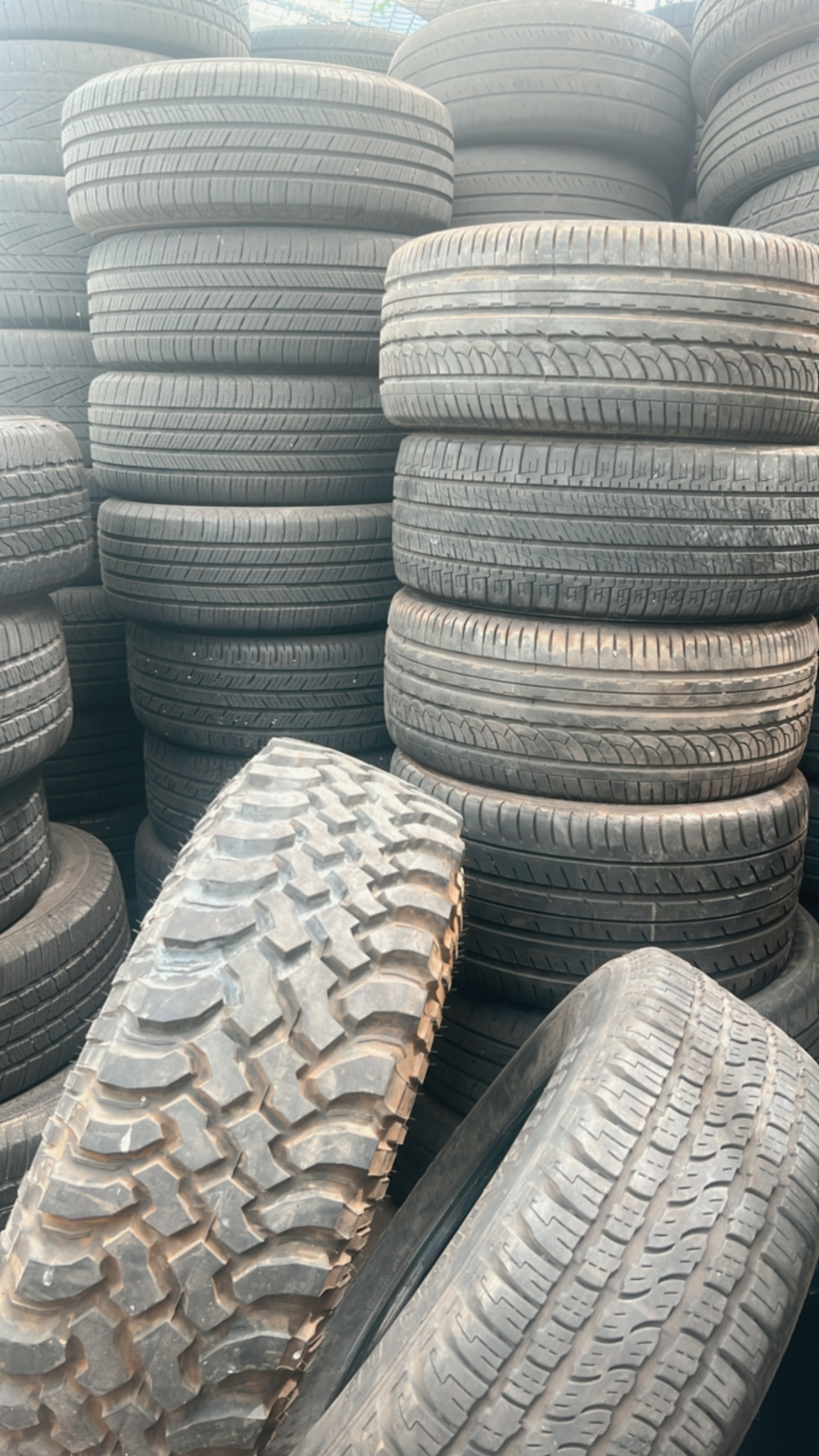 Tire inventory at Central Car Care auto repair shop in Phoenix, AZ